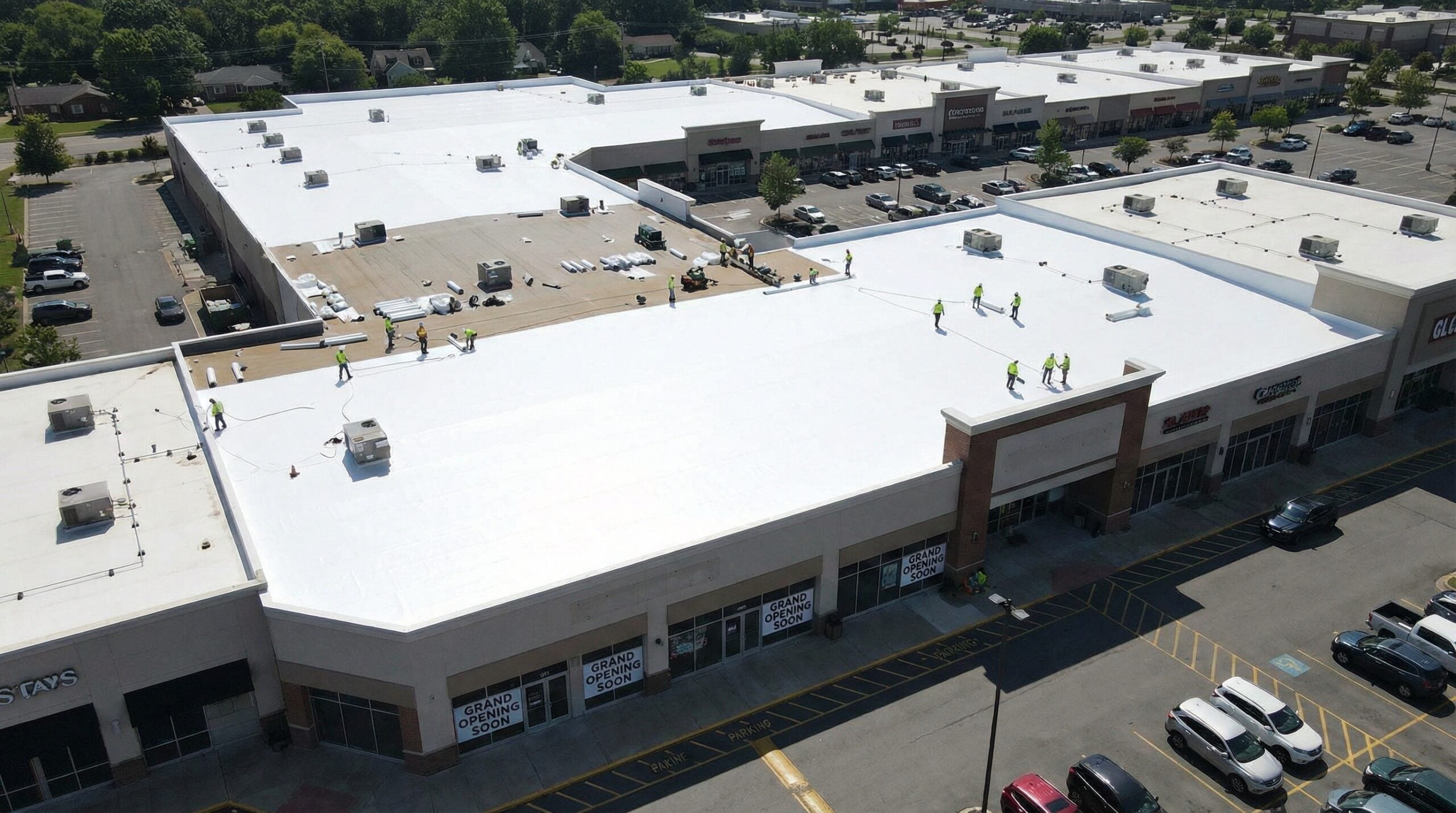 New white reflective roof on a commercial shopping center