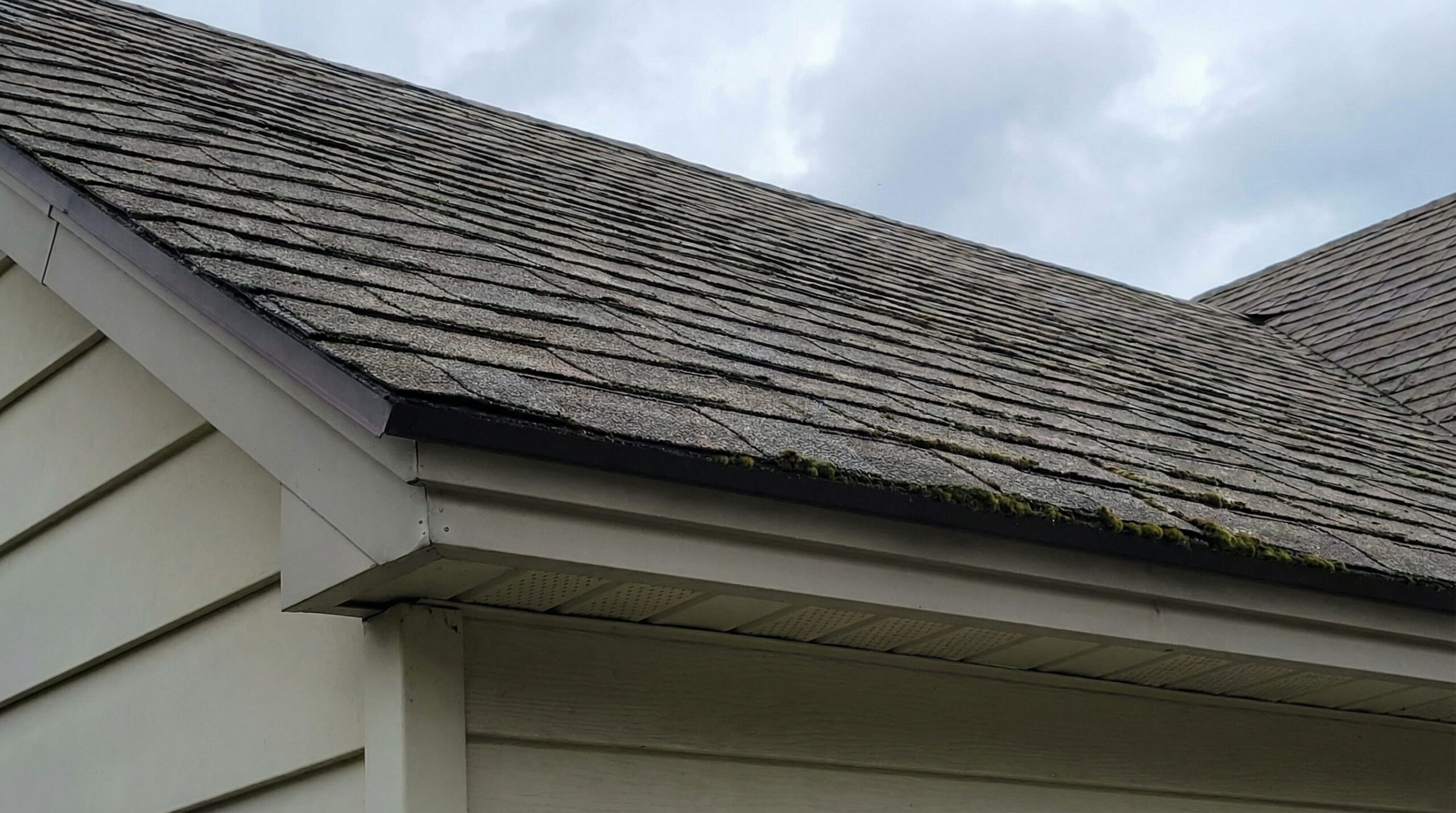 Before and after comparison of roof with hurricane clips and wind-resistant features