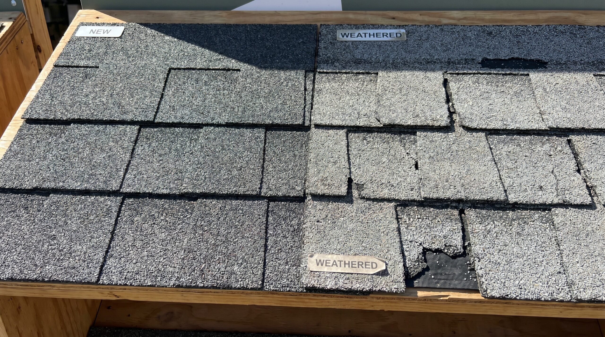 Close-up comparison of new vs weathered architectural shingles showing granule loss and UV damage