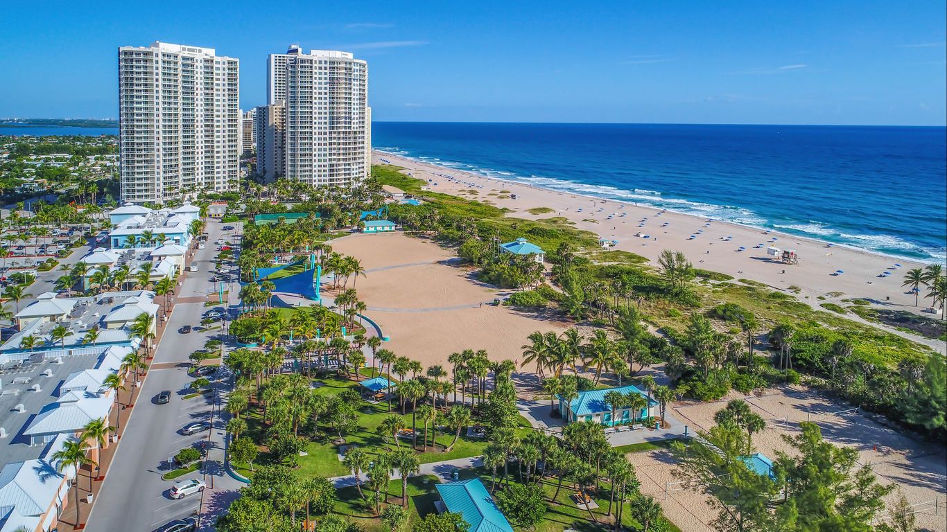Aerial view of waterfront homes and roofs in Riviera Beach, FL