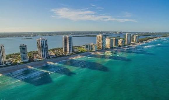 Aerial view of oceanfront condo roofs on Singer Island in Riviera Beach, FL
